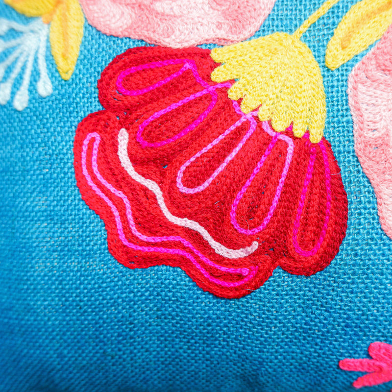 Embroidered Flower Cushion with Pom Poms - Vendeo.co.uk